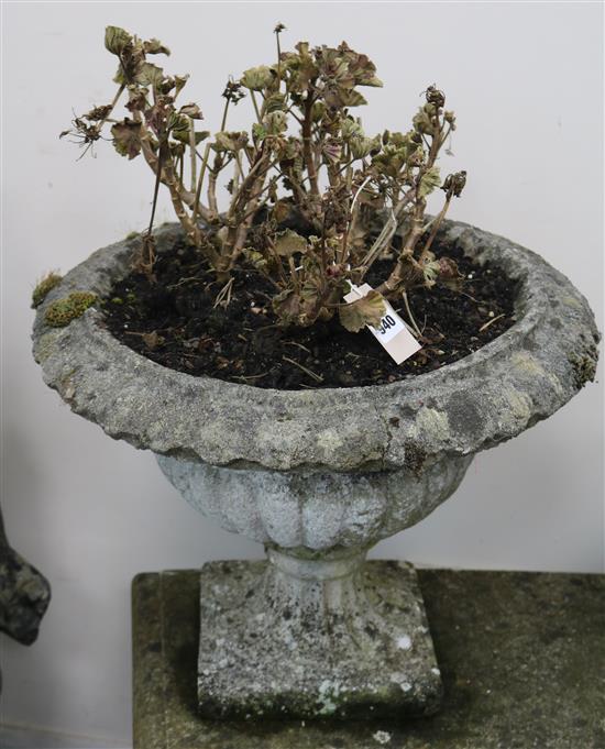 A pair of weathered composition garden urns, H.1ft 3in. Diam.1ft 8in.